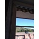 Tenda da sole a caduta con guide a veranda